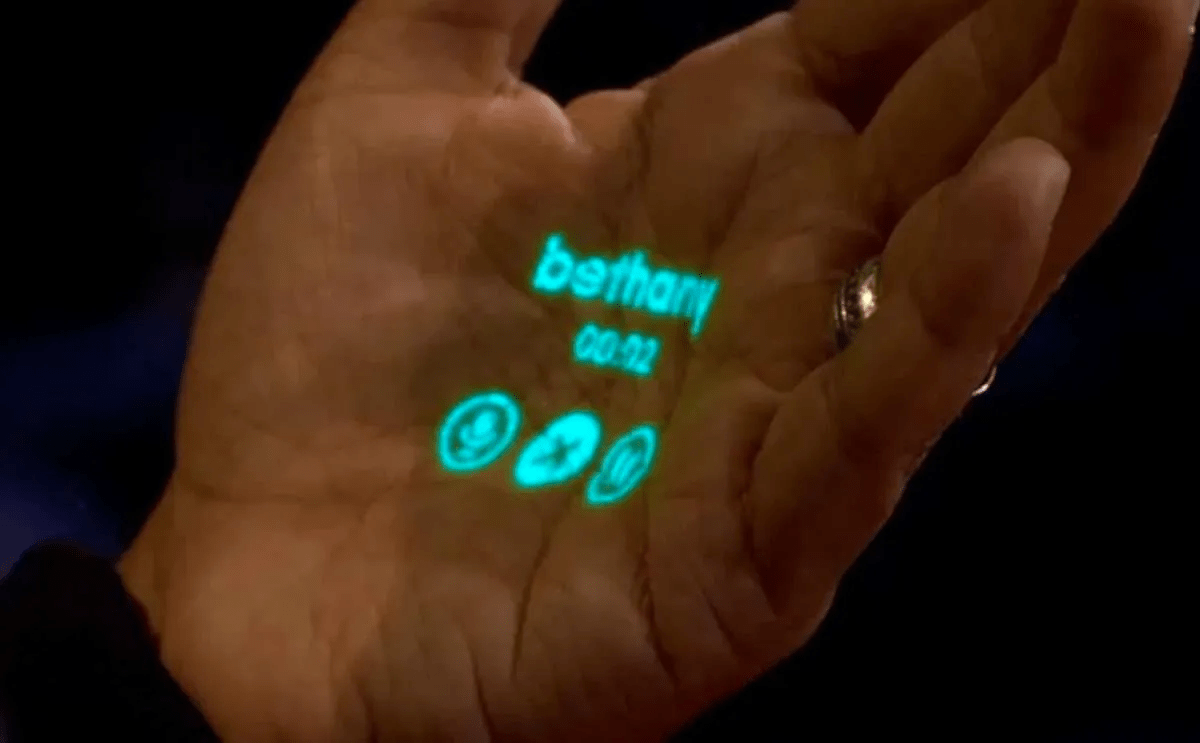 Humane demo with a phone-like screen projected on a man's hand